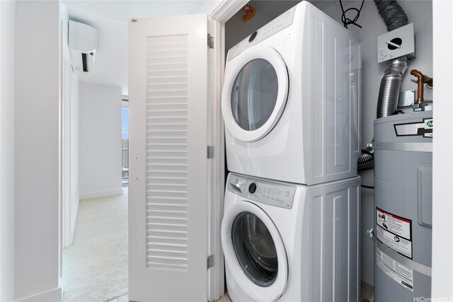 629 Keeaumoku St Unit 2103, Honolulu, HI 96814 - washroom featuring stacked washer and clothes dryer, electric water heater, and light carpet