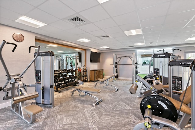 629 Keeaumoku St Unit 2103, Honolulu, HI 96814 - exercise room with a paneled ceiling, carpet, and baseboards
