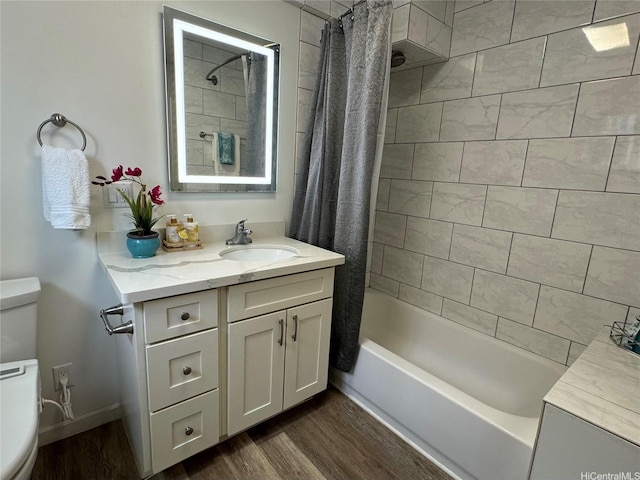 410 Nahua St Unit 302, Honolulu, HI 96815 - bathroom featuring toilet, wood finished floors, shower / bath combo, and vanity