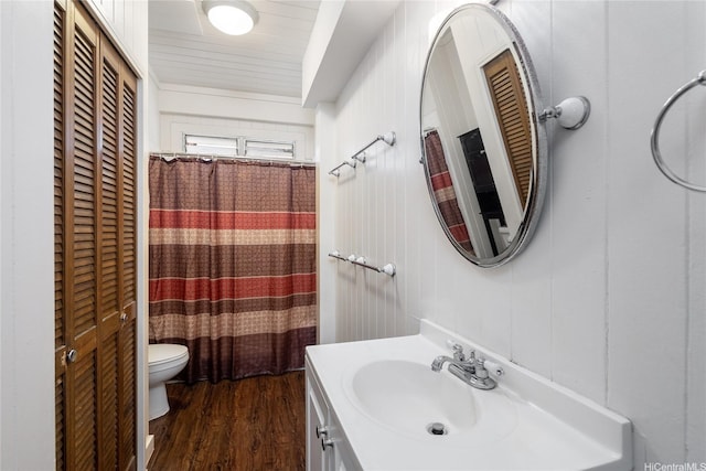 3453 Edna St, Honolulu, HI 96815 - full bathroom featuring toilet, vanity, wood finished floors, and a shower with shower curtain