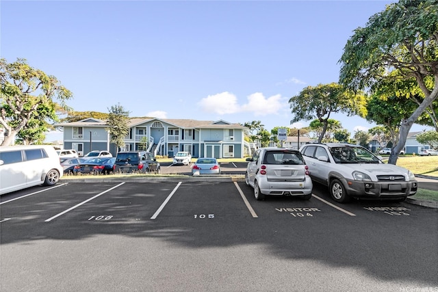 94-820 Lumiauau St Unit G201, Waipahu, HI 96797 - uncovered parking lot featuring a residential view