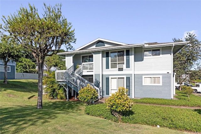 94-820 Lumiauau St Unit G201, Waipahu, HI 96797 - view of front of property featuring stairs, a front lawn, and a porch