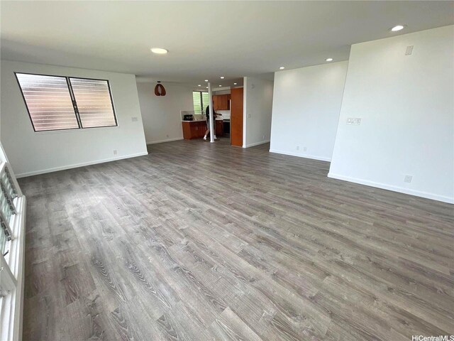 47-218 Kamehameha Hwy, Kaneohe, HI 96744 - unfurnished living room featuring wood finished floors, recessed lighting, and baseboards