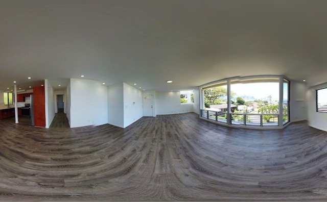 47-218 Kamehameha Hwy, Kaneohe, HI 96744 - unfurnished living room with recessed lighting, dark wood finished floors, and healthy amount of natural light