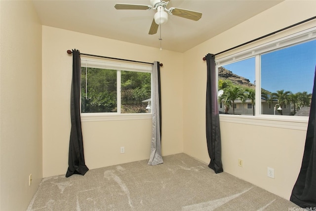 87-2233 Pakeke St, Waianae, HI 96792 - carpeted empty room featuring healthy amount of natural light and ceiling fan
