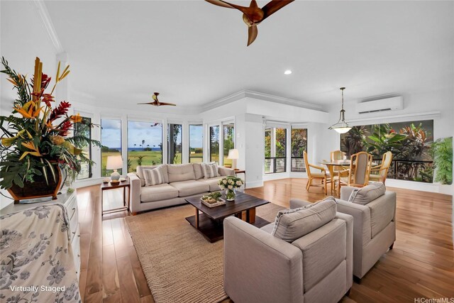 382 Kuanalu Pl, Honolulu, HI 96825 - living room with a ceiling fan, an AC wall unit, crown molding, recessed lighting, and wood finished floors