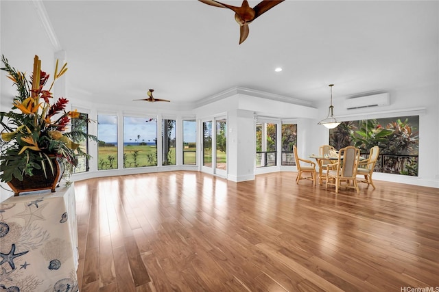 382 Kuanalu Pl, Honolulu, HI 96825 - living area with a ceiling fan, an AC wall unit, ornamental molding, recessed lighting, and light wood-type flooring