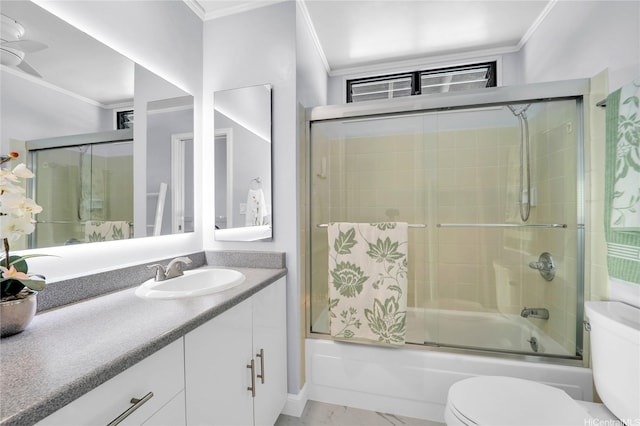 382 Kuanalu Pl, Honolulu, HI 96825 - bathroom featuring ornamental molding, toilet, vanity, and combined bath / shower with glass door