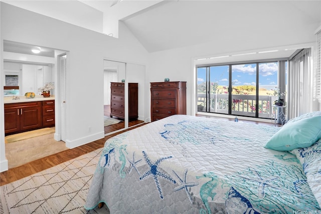 382 Kuanalu Pl, Honolulu, HI 96825 - bedroom with light wood-style flooring, access to exterior, baseboards, high vaulted ceiling, and connected bathroom