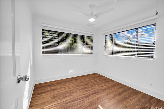 382 Kuanalu Pl, Honolulu, HI 96825 - empty room with healthy amount of natural light, baseboards, and wood finished floors