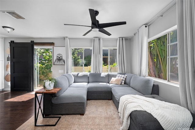 91-422 Makalea St Unit 94, Ewa Beach, HI 96706 - living area with ceiling fan and wood finished floors