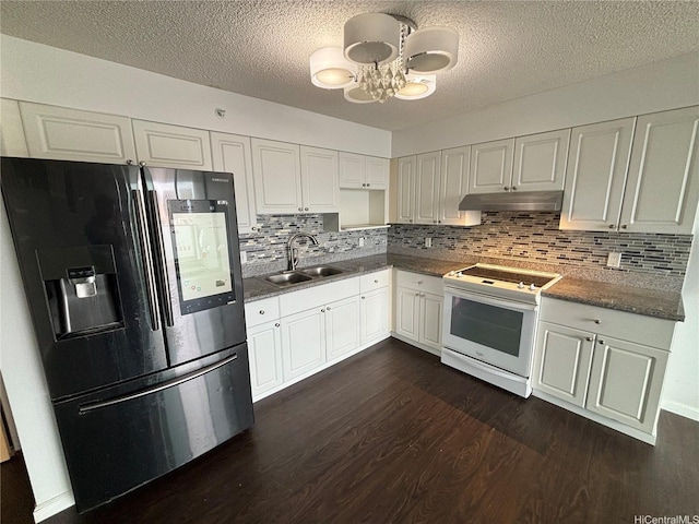 801 S St Unit 1723, Honolulu, HI 96813 - kitchen with refrigerator with ice dispenser, a sink, white electric range oven, under cabinet range hood, and dark wood finished floors