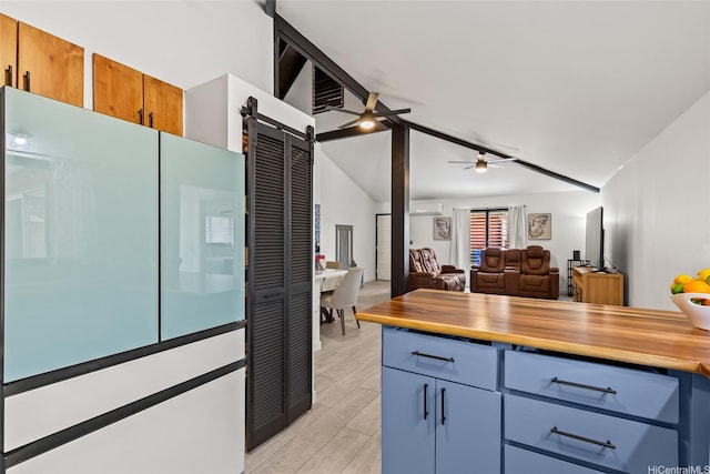 94-265 Anania Dr, Mililani, HI 96789 - kitchen with a barn door, lofted ceiling, open floor plan, light wood-style floors, and ceiling fan