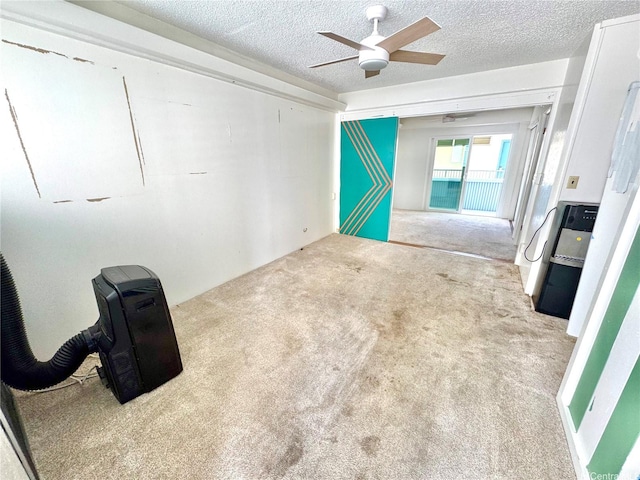 410 Nahua St Unit 404, Honolulu, HI 96815 - unfurnished room with a textured ceiling, ceiling fan, and carpet flooring