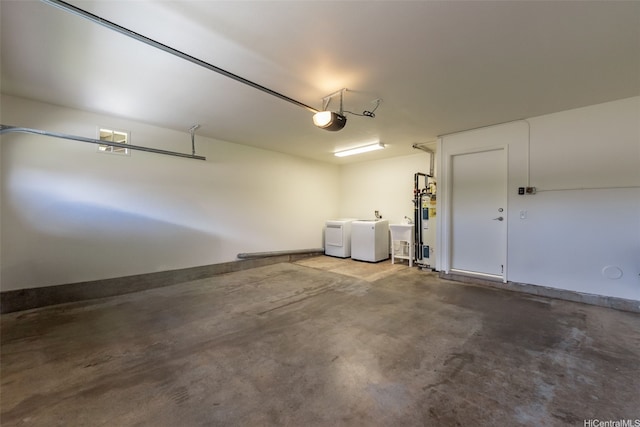 95-1204 Moea St Unit 48, Mililani, HI 96789 - garage featuring washing machine and clothes dryer, a garage door opener, and a sink