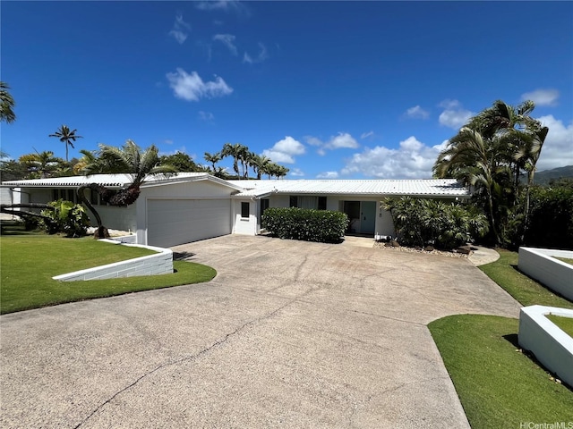 118 Kalalau St, Honolulu, HI 96825 - ranch-style house featuring a front lawn, a garage, driveway, and metal roof