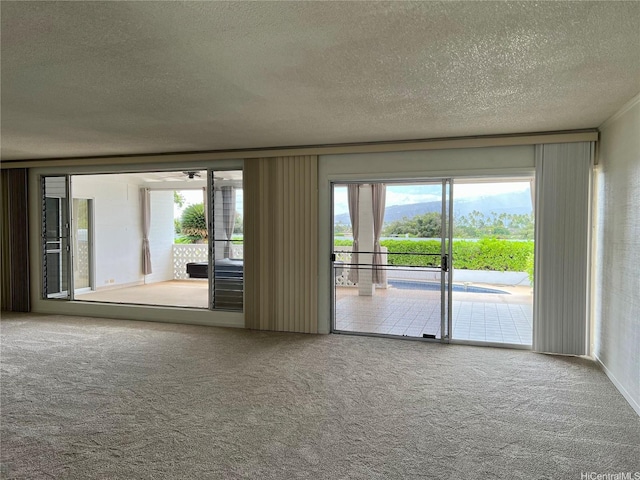118 Kalalau St, Honolulu, HI 96825 - carpeted spare room featuring a textured ceiling