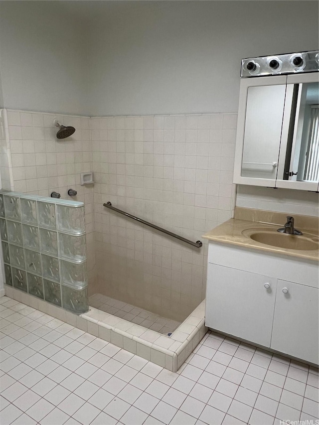 118 Kalalau St, Honolulu, HI 96825 - bathroom featuring a walk in shower, tile patterned flooring, and vanity