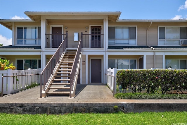 95-1059 Koolani Dr Unit 4, Mililani, HI 96789 - view of front of property featuring stairs and fence