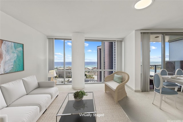 555 S St Unit 2905, Honolulu, HI 96813 - carpeted living room with a wall of windows, a water view, and baseboards