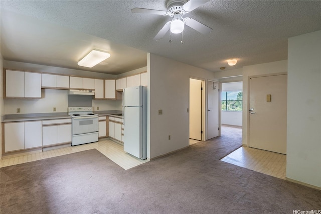 95-1045 Kaapeha St Unit 172, Mililani, HI 96789 - kitchen with white appliances, under cabinet range hood, light colored carpet, a textured ceiling, and a ceiling fan