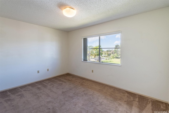 95-1045 Kaapeha St Unit 172, Mililani, HI 96789 - carpeted spare room featuring a textured ceiling and baseboards