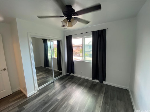 91-1001 Keaunui Dr Unit 441, Ewa Beach, HI 96706 - unfurnished bedroom with wood finished floors, baseboards, and a closet