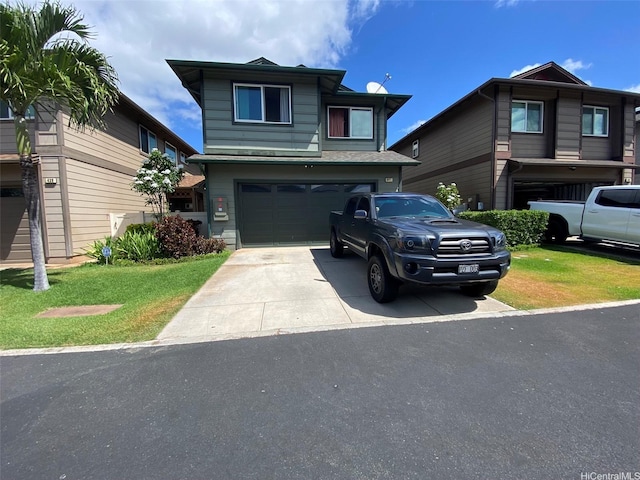 91-1001 Keaunui Dr Unit 441, Ewa Beach, HI 96706 - view of front of property featuring driveway, a garage, and a front yard