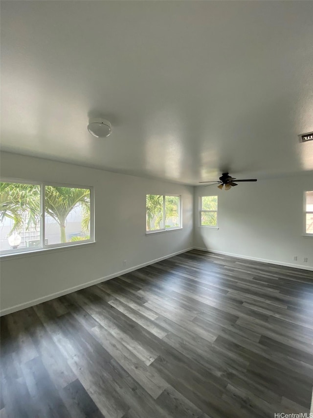 91-1001 Keaunui Dr Unit 441, Ewa Beach, HI 96706 - unfurnished room featuring plenty of natural light, dark wood-style floors, and baseboards