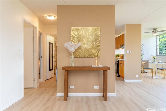 94-327 Hokuahiahi St Unit 325, Mililani, HI 96789 - hall featuring light wood finished floors and baseboards
