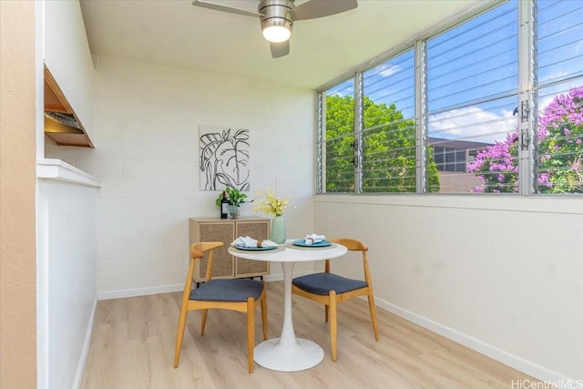 94-327 Hokuahiahi St Unit 325, Mililani, HI 96789 - dining room with wood finished floors, ceiling fan, and baseboards