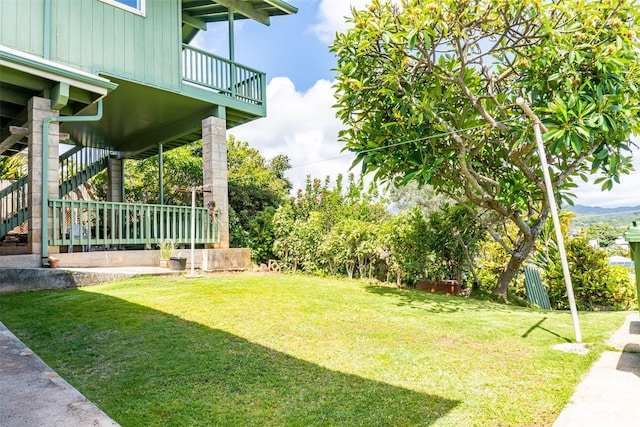 1164 Manulani St, Kailua, HI 96734 - view of green lawn with stairs and a balcony