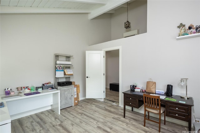 7549 Puumahoe Pl, Honolulu, HI 96825 - office space featuring beam ceiling, light wood finished floors, high vaulted ceiling, a wall unit AC, and baseboards