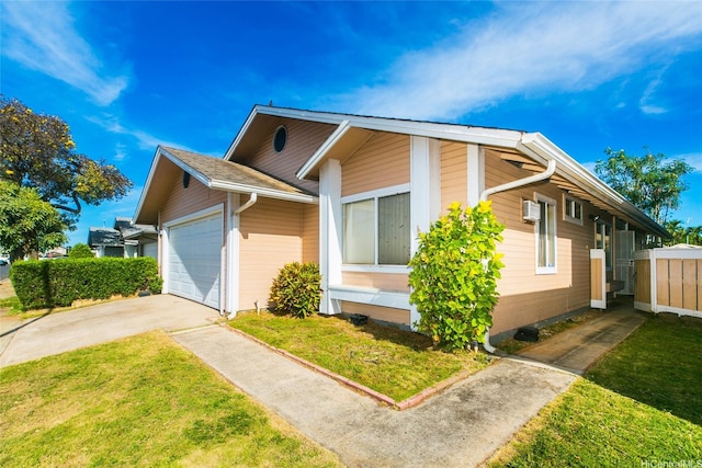 91-1006 Wahineomao Pl, Ewa Beach, HI 96706 - view of home's exterior with a garage, concrete driveway, and a yard