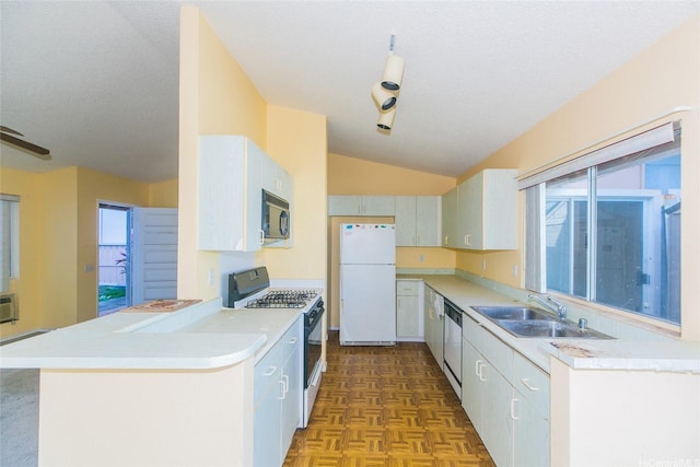91-1006 Wahineomao Pl, Ewa Beach, HI 96706 - kitchen with freestanding refrigerator, gas stove, a sink, stainless steel dishwasher, and black microwave