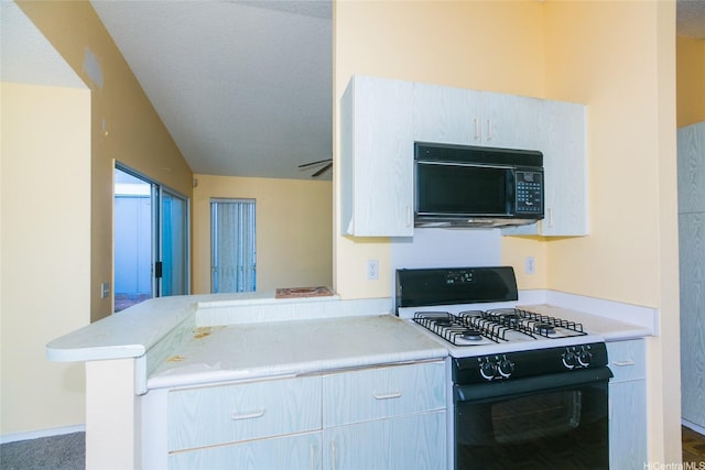 91-1006 Wahineomao Pl, Ewa Beach, HI 96706 - kitchen with black microwave, gas range, light countertops, and a peninsula