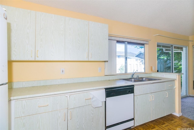 91-1006 Wahineomao Pl, Ewa Beach, HI 96706 - kitchen with white appliances, a sink, light countertops, and a textured ceiling