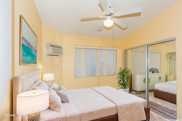 91-1006 Wahineomao Pl, Ewa Beach, HI 96706 - bedroom with an AC wall unit, a closet, and ceiling fan