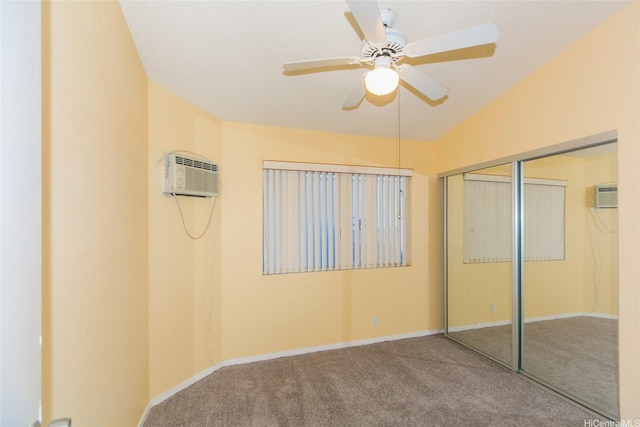 91-1006 Wahineomao Pl, Ewa Beach, HI 96706 - unfurnished bedroom featuring carpet flooring, a wall unit AC, a closet, and baseboards