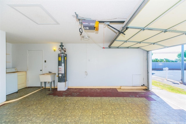 91-1006 Wahineomao Pl, Ewa Beach, HI 96706 - garage featuring water heater, washer / dryer, a garage door opener, and a sink