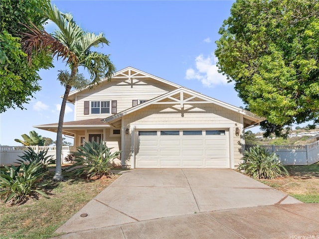 92-308 Palaulau Pl Unit 70, Kapolei, HI 96707 - view of front facade with fence, driveway, and a garage