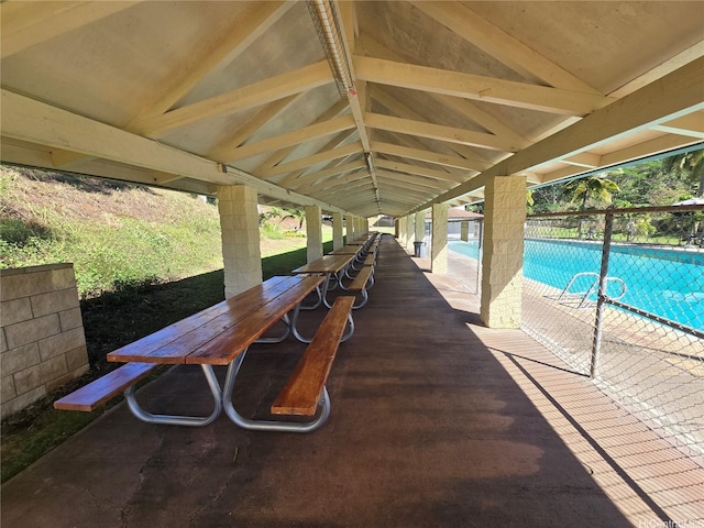95-009 Waikalani Dr Unit B202, Mililani, HI 96789 - view of patio / terrace with an outdoor pool and fence
