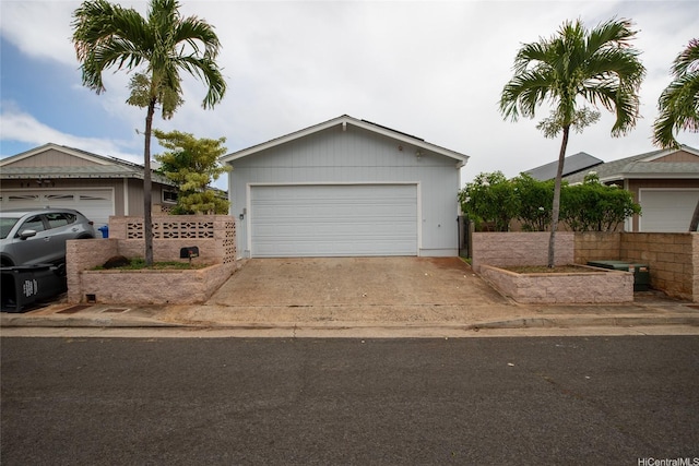 94-607 Minoaka Pl, Waipahu, HI 96797 - view of front of home with fence and a detached garage