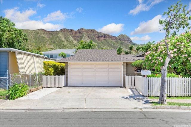 3115 Kaunaoa St, Honolulu, HI 96815 - view of front of property featuring a mountain view and a detached garage