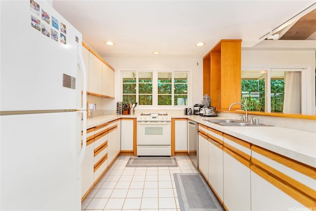 3115 Kaunaoa St, Honolulu, HI 96815 - kitchen with white appliances, a sink, healthy amount of natural light, light countertops, and recessed lighting
