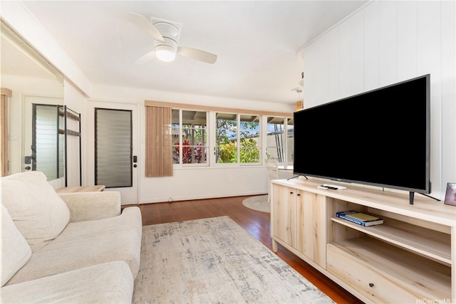 3115 Kaunaoa St, Honolulu, HI 96815 - living area with a ceiling fan and dark wood-style flooring