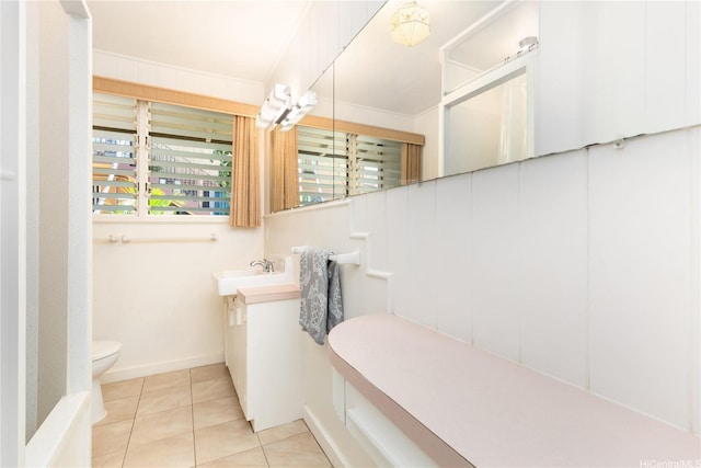3115 Kaunaoa St, Honolulu, HI 96815 - bathroom featuring toilet, tile patterned floors, vanity, and baseboards