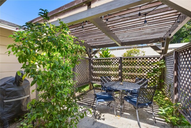 3115 Kaunaoa St, Honolulu, HI 96815 - fenced backyard featuring a pergola, outdoor dining space, and a patio area