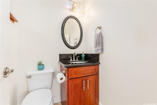 2123 10th Ave Unit C, Honolulu, HI 96816 - half bath featuring toilet, vanity, and baseboards