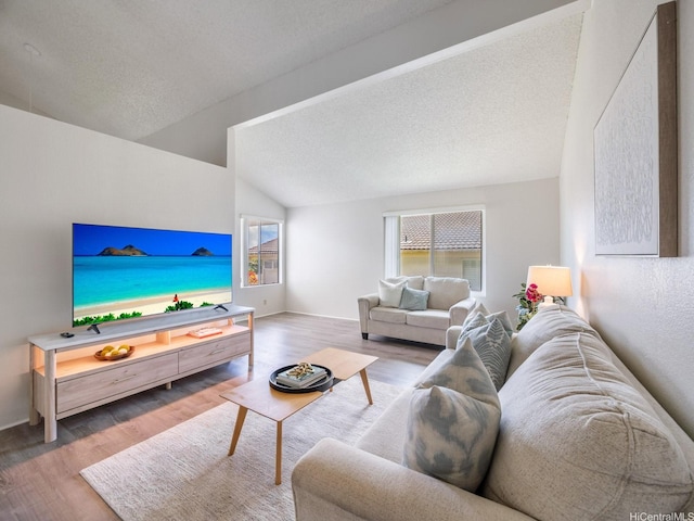45-812 Kupohu St, Kaneohe, HI 96744 - living area with wood finished floors, lofted ceiling, and a textured ceiling